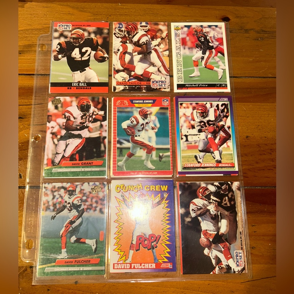 A sheet of NFL Bengals 1980’s & 1990’s Trading Cards. Brands NFL Pro and Score.